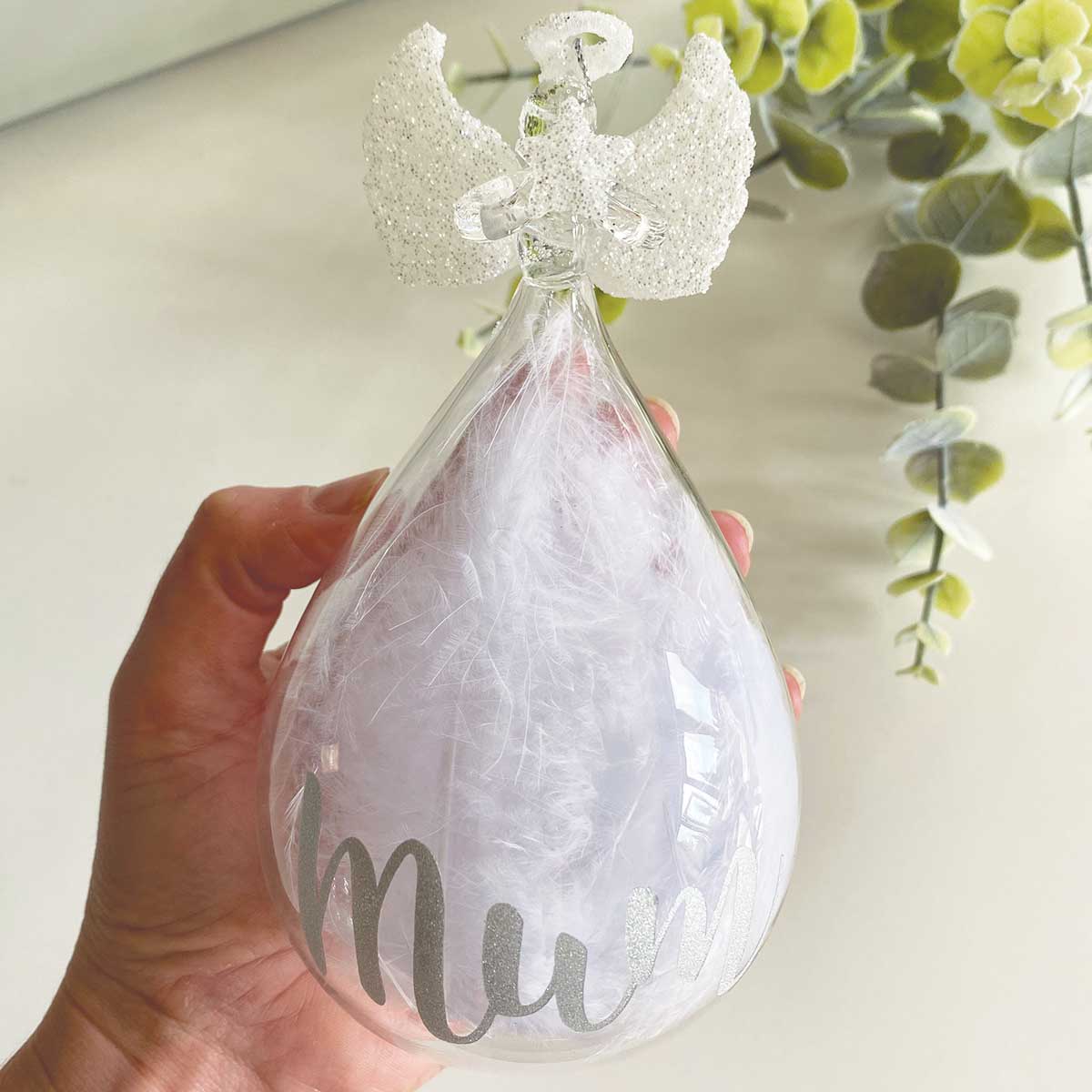 Personalised Memorial Ornament. Clear Glass Angel With Glitter And Feathers.